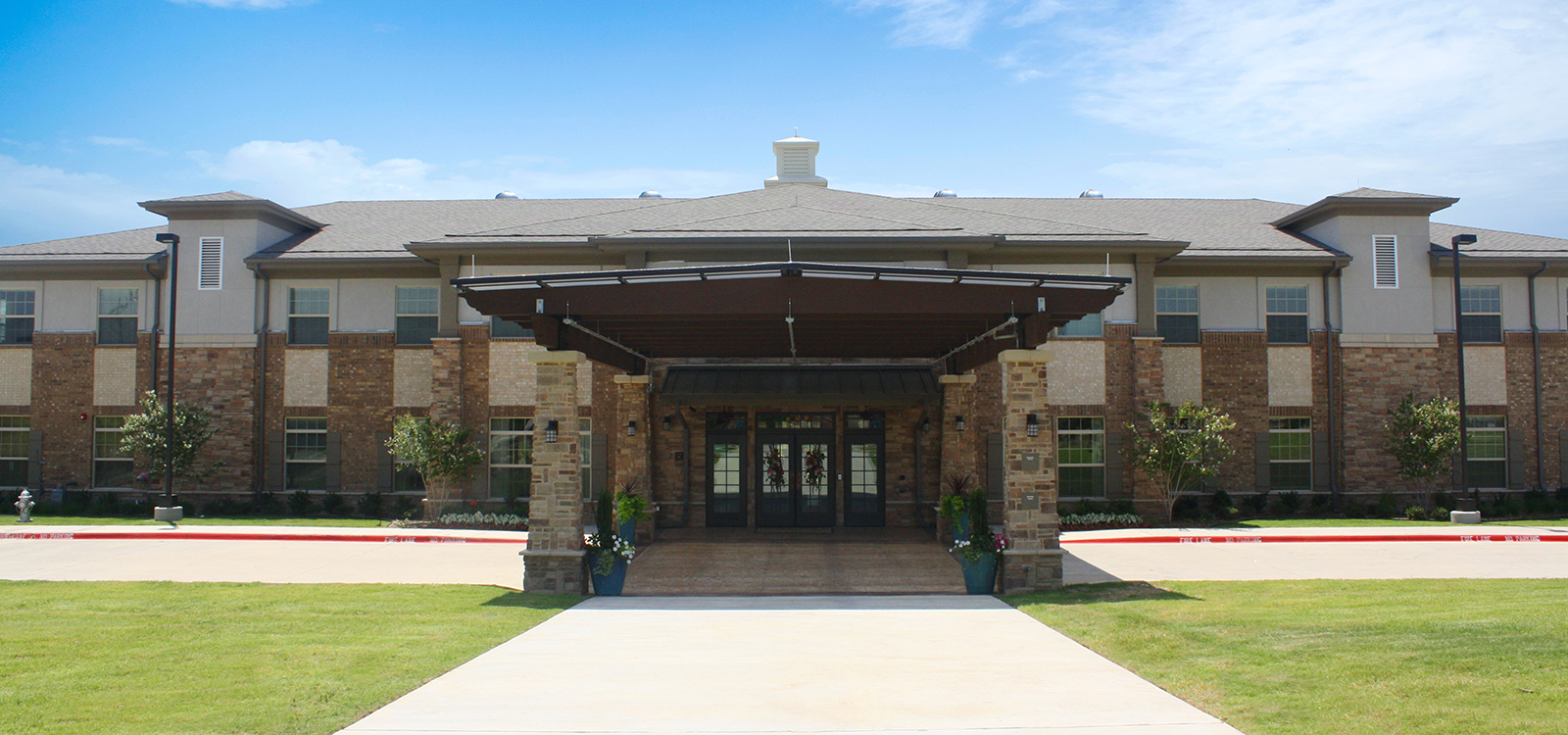 Front entrance of assisted living senior community