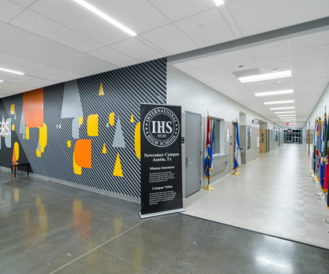 Eastside High School hallway painted and flags