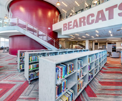 Vibrant new library at Sherman High School with Bearcats mascot text